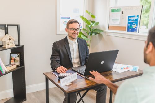 Mortgage broker meeting with a client to discuss loan options