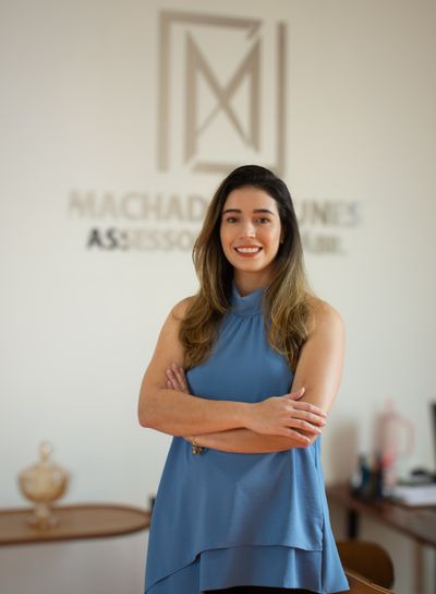 Portrait of a mortgage broker smiling in an office setting