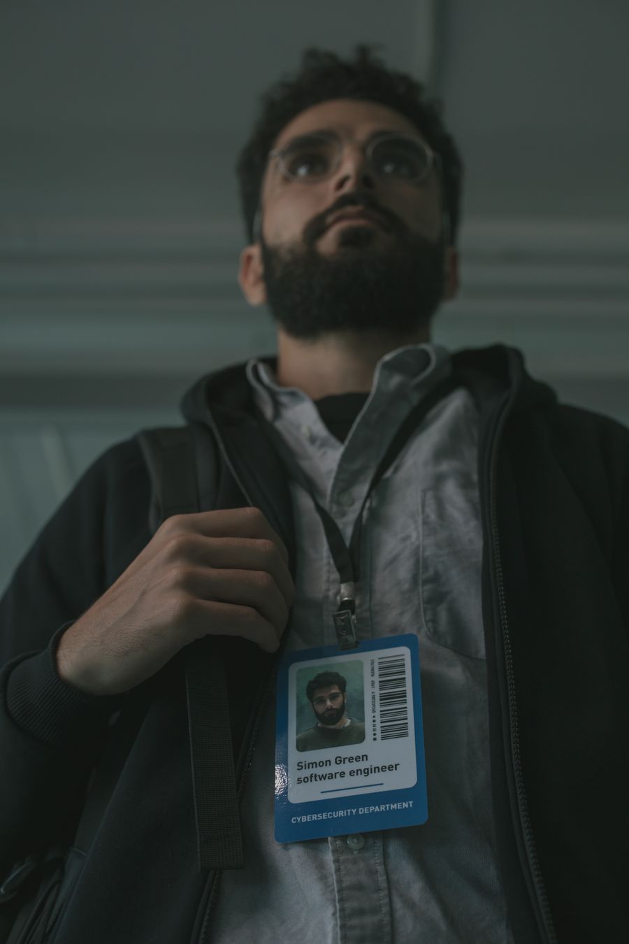 IT security professional wearing an access badge in a secure facility