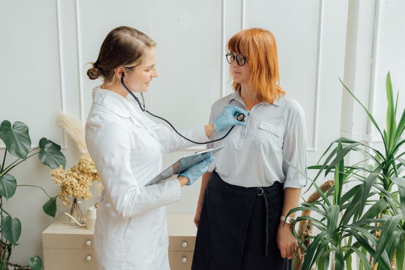A clinician conducting a thorough physical examination